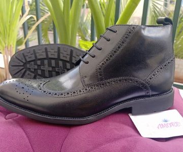 Black brogue boot