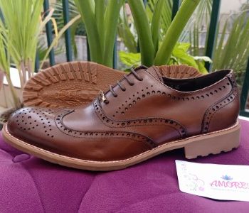 Dark brown brogue with brown sole