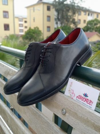 Black frontline shoe with red inner