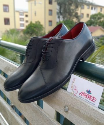 Black frontline shoe with red inner