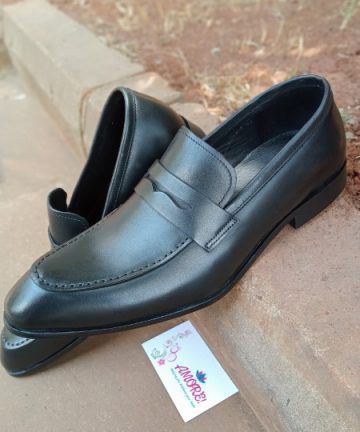 Black pointed penny loafer