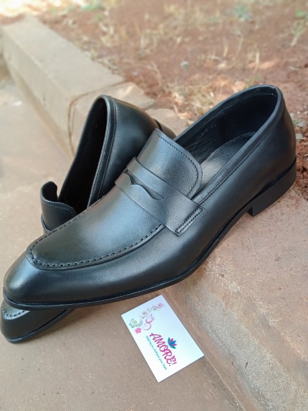 Black pointed penny loafer
