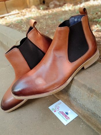 Brown chelsea boot with brown sole