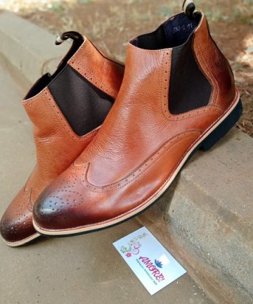 Brown chelsea wing tip boot