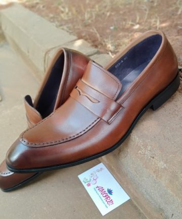 Brown pointed penny loafer