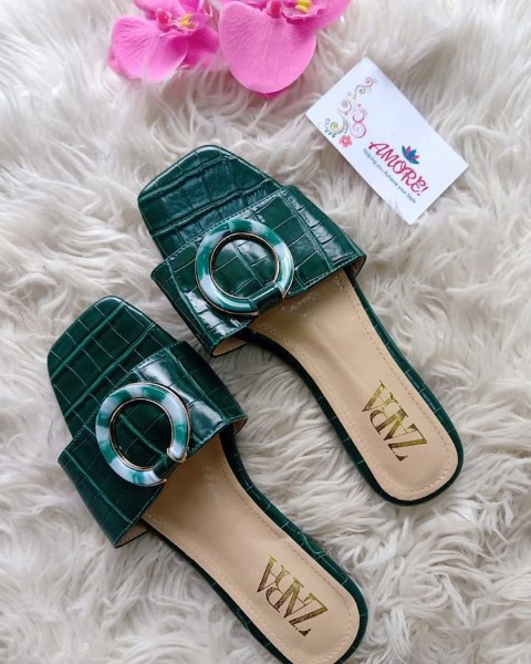 Green sandal with ring