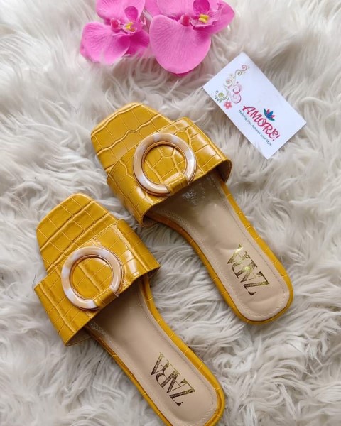 Yellow sandal with ring