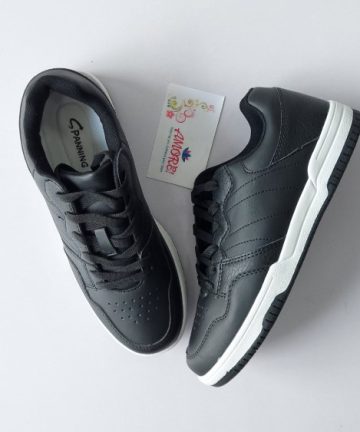 Black sneaker with white and bloack sole